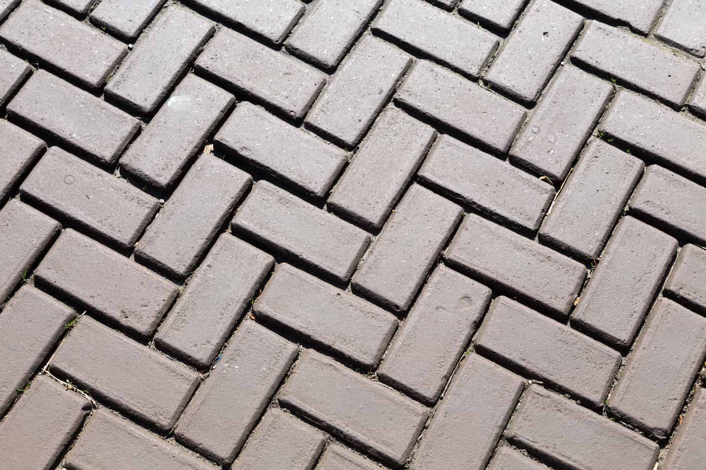 An image of Dark gray brick pavers.