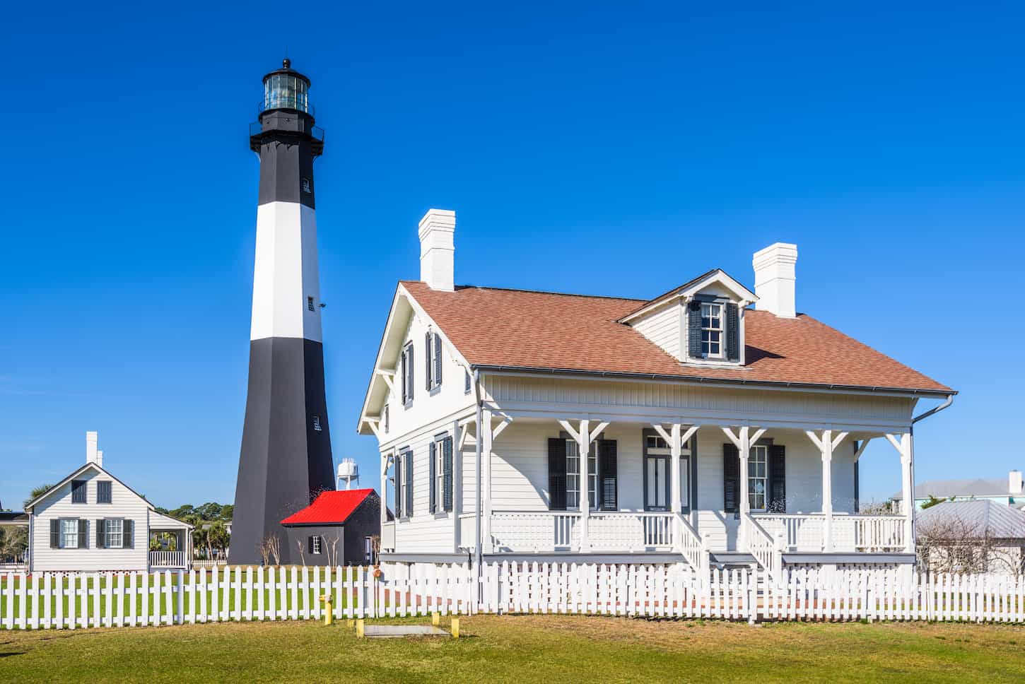 An image of Tybee Island Light House white fence of Tybee Island, Georgia, USA.